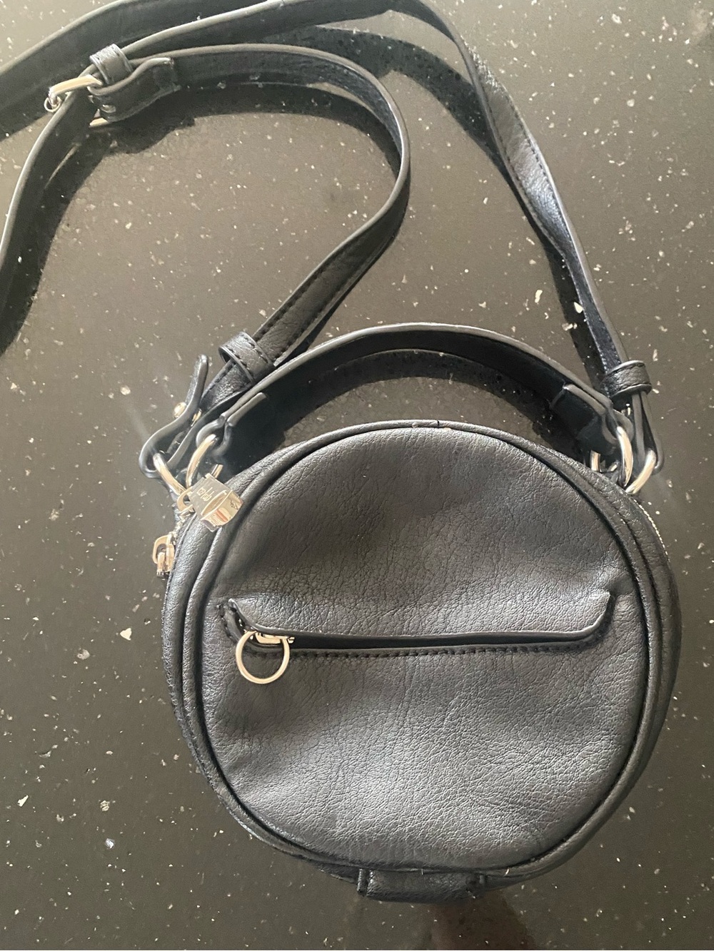 Round Black Leatherette Crossbody Bag with Front Zip Pocket